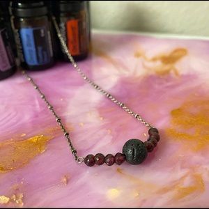 Lava with garnet beads